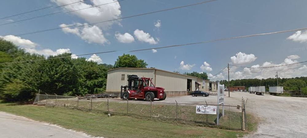 Income Producing - Industrial Building - New 10 year lease NNN Lease- AVG Cap 8%: 2506 Flat Shoals Rd SE, Conyers, GA 30013